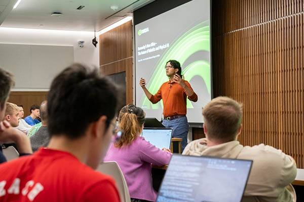Deepu Talla giving a talk in front of students