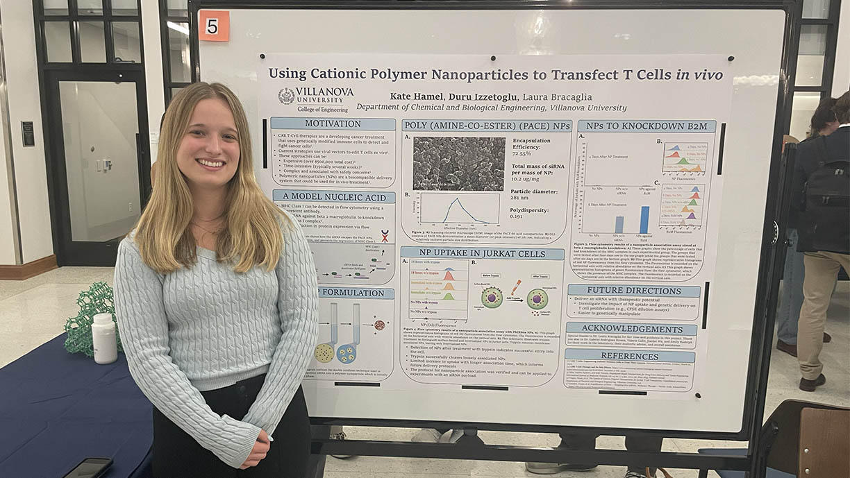 Kate Hamel with a research poster