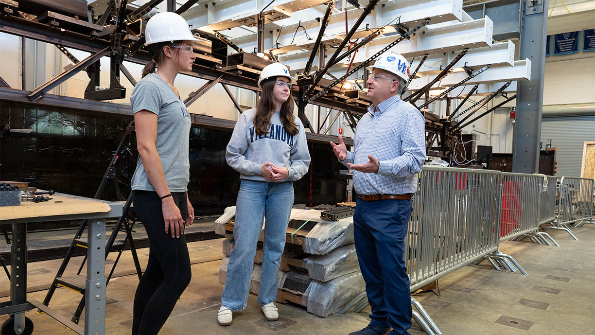 David Dinehart and two students in the Structures Lab