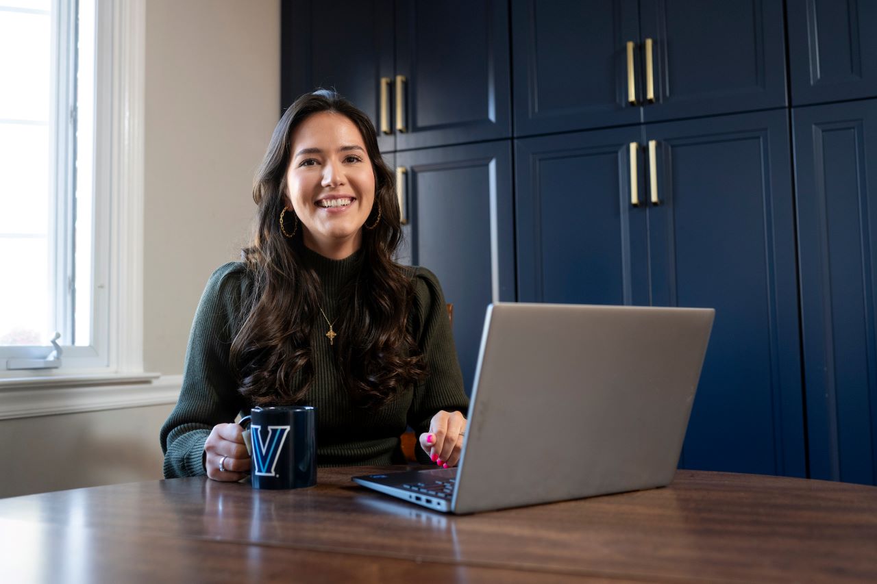 HR student working at laptop