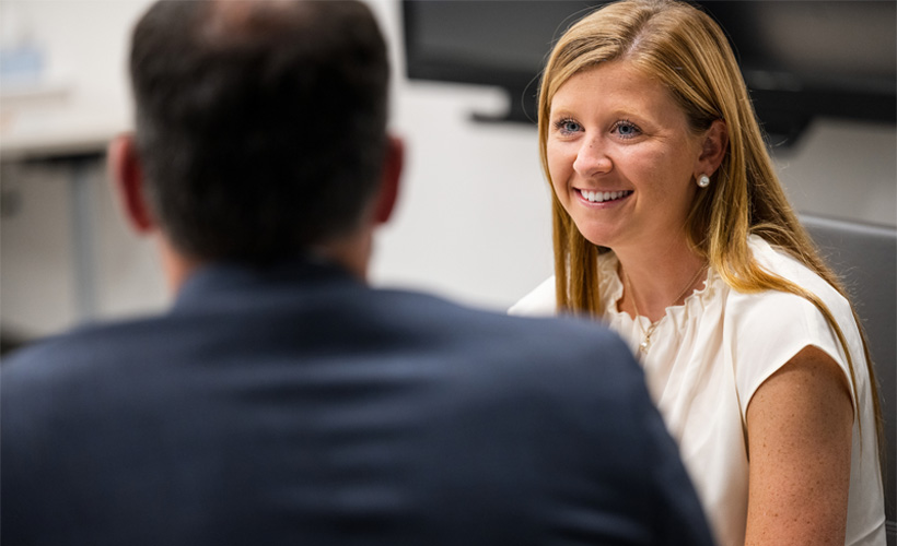 student interacts with employer