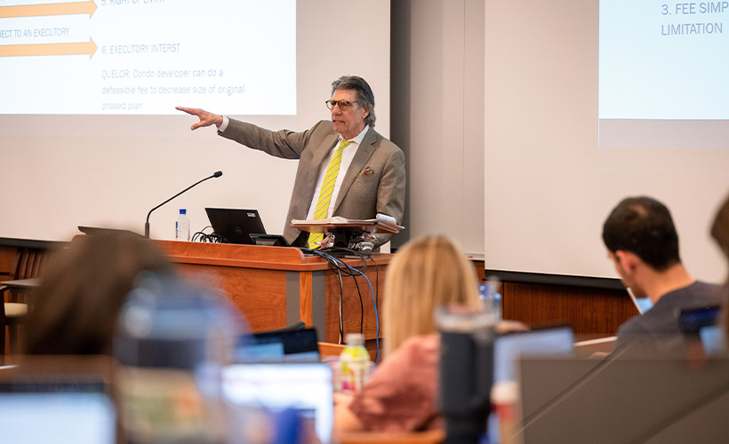 professor teaching in front of a classroom of law students