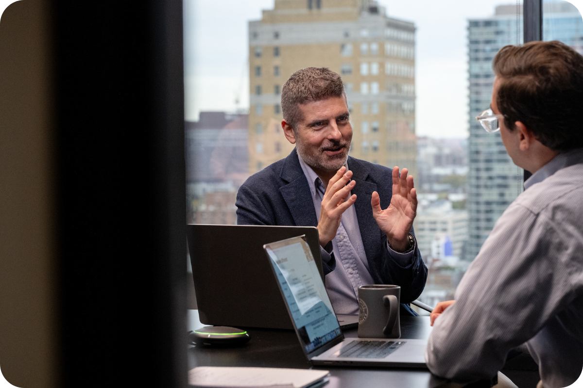 People talking at a conference table