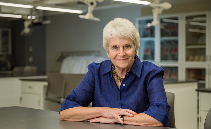 Dean Adele Lindenmeyer in a science lab