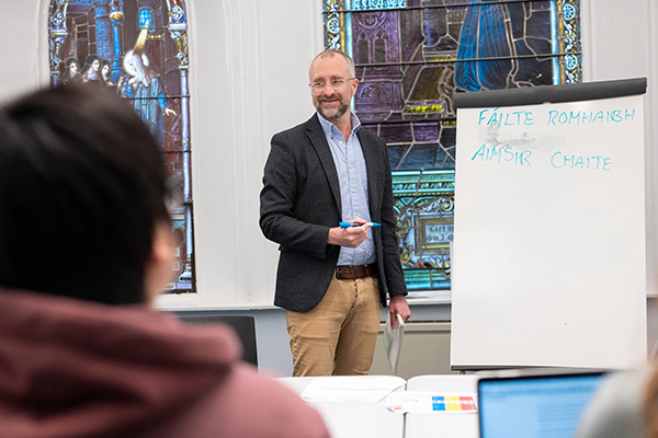 Jonathan O'Neill, PhD, teaches Gaelic to his students.