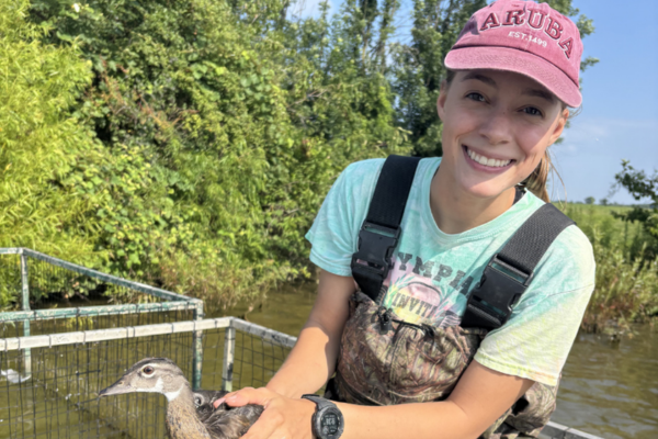 Faith Yost works in the field.