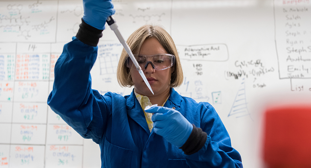 graduate chemistry student working in the lab