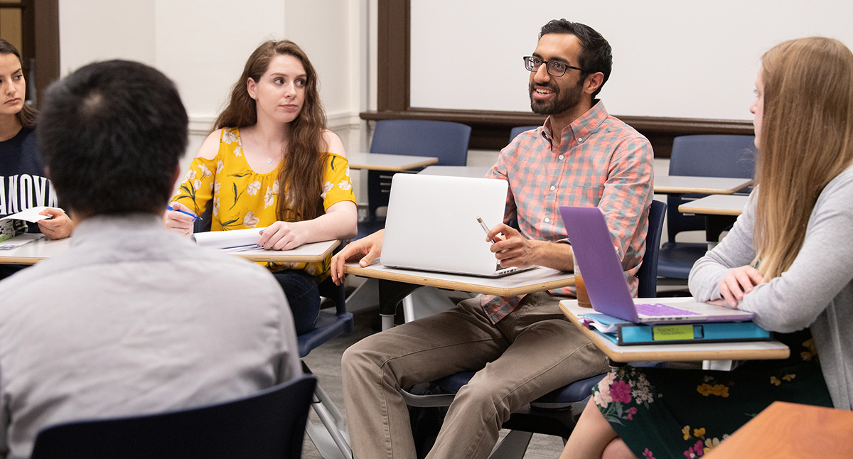 Graduate counseling students having a class discussion