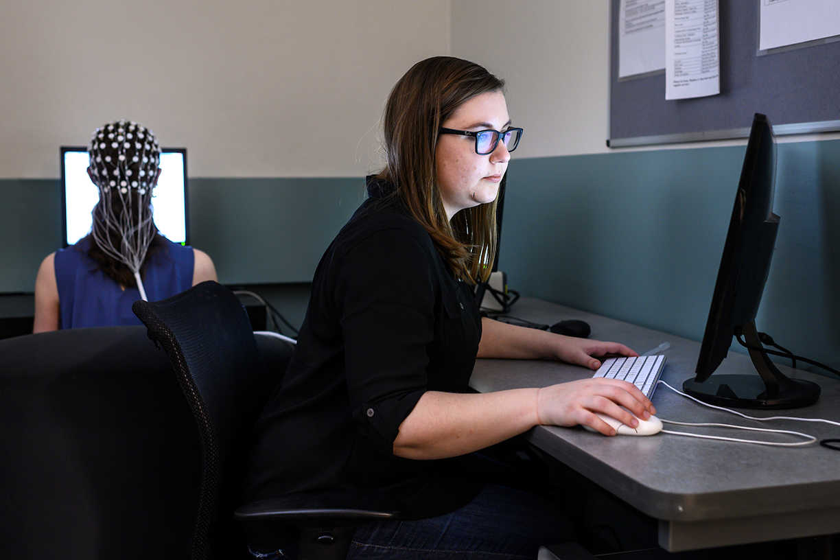 Psychology students running tests in a lab