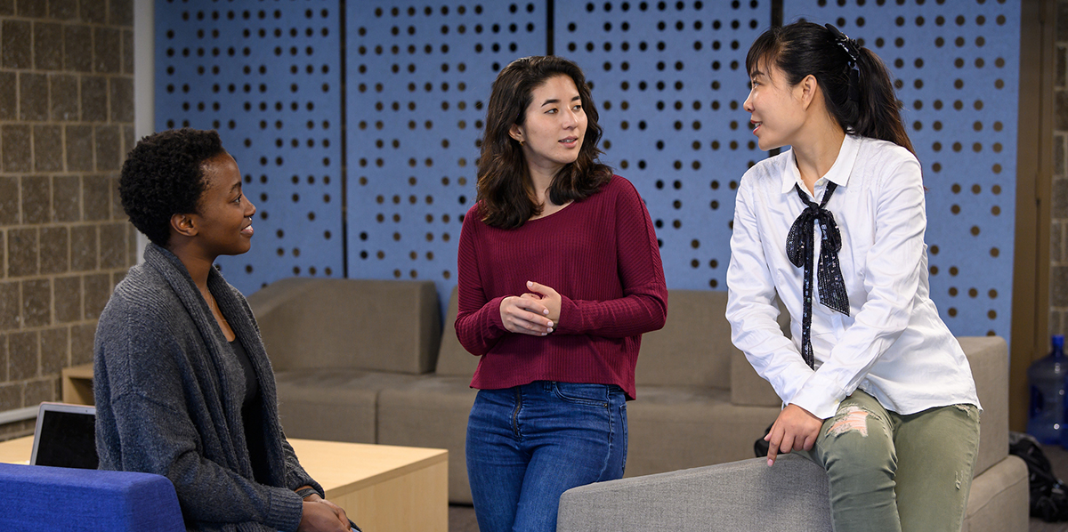 graduate students in group discussion