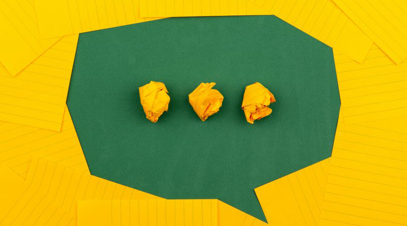 text bubble icon made out of paper
