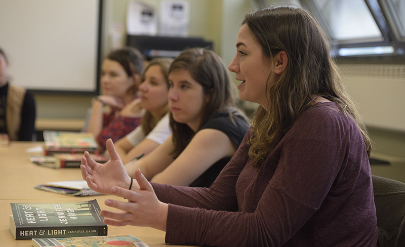 Students participate in a discussion during class.