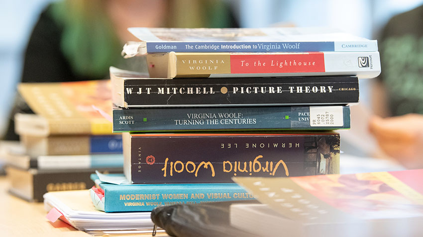 books stacked on desk
