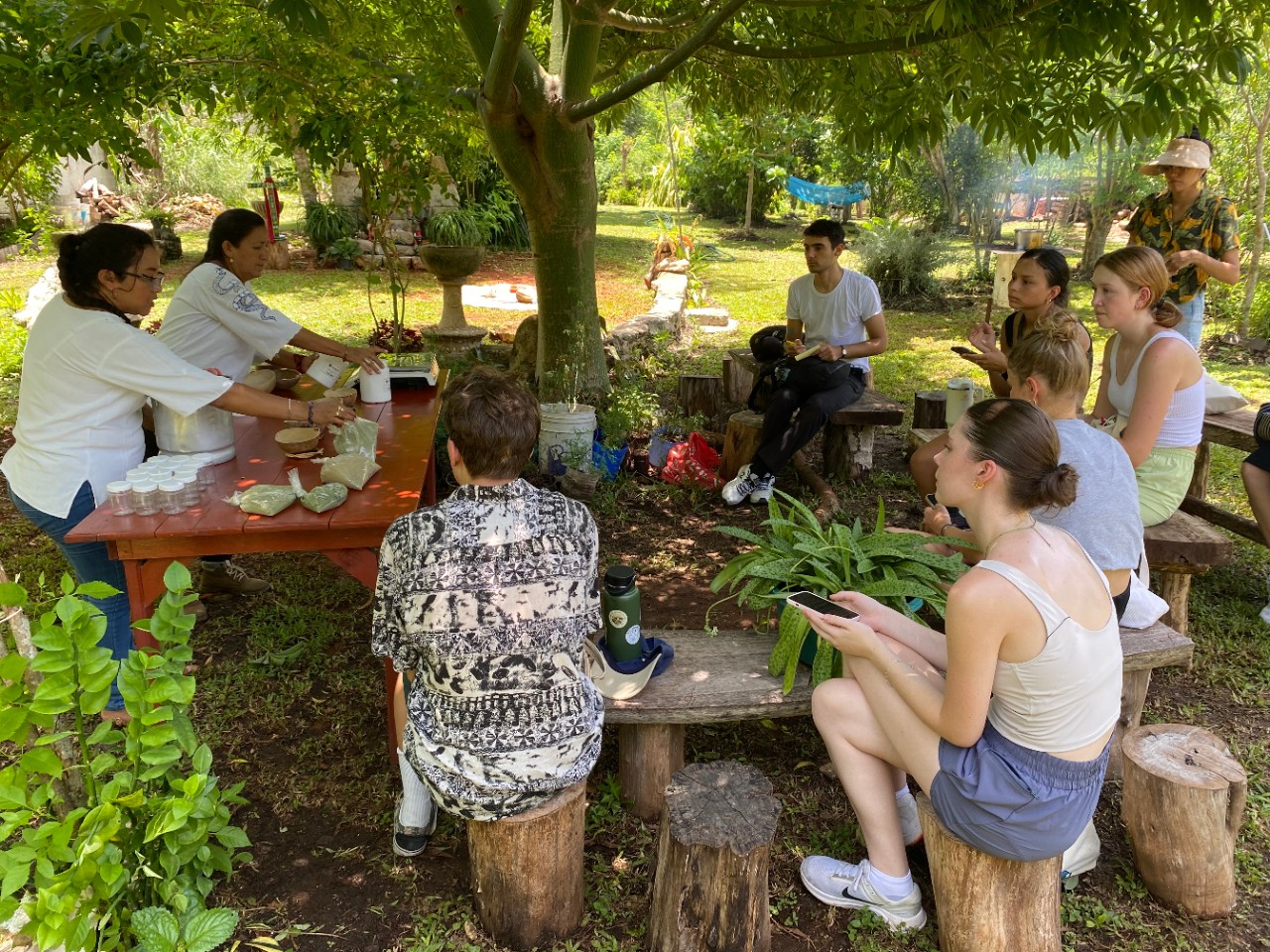 students outside, talking in the Yucatan..