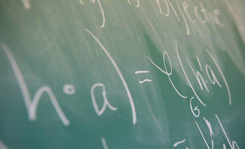 image of math formula on chalk board.