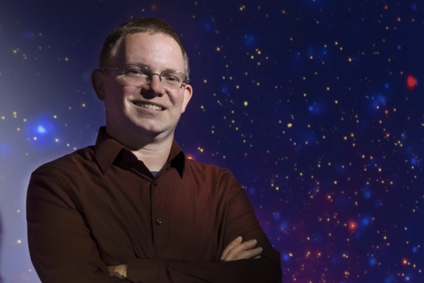 Joey Neilsen with galaxy background