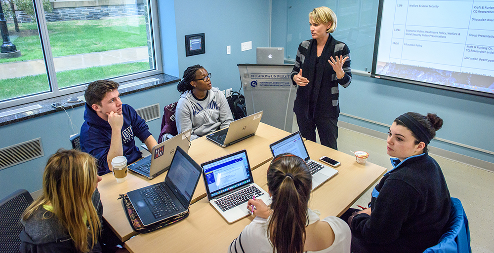 image of professor teaching group