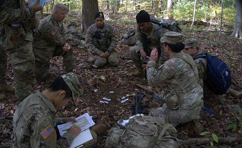 ROTC cadets work in the field.