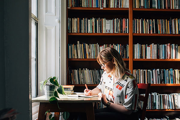 A woman at a desk