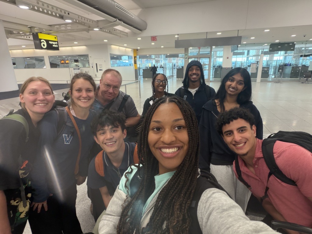 Group of students and staff posing for picture