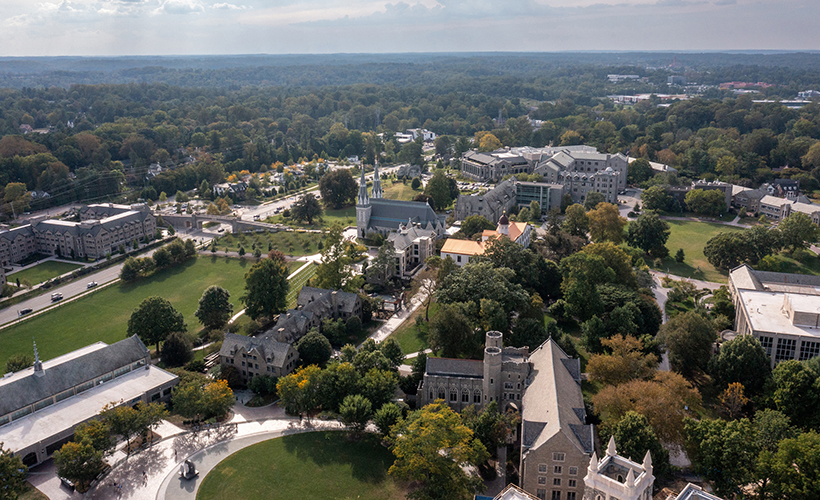 Student Walks By Grotto