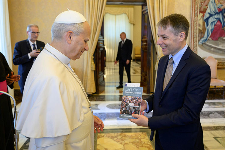 Pope Leo XIV speaks with Professor Massimo Faggioli