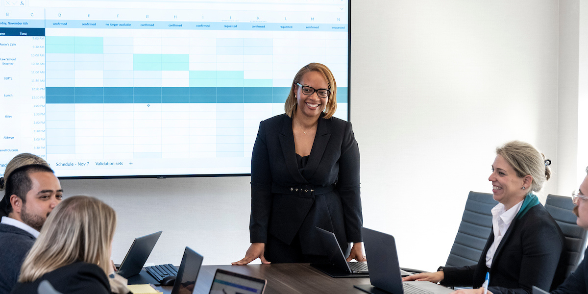 corporate professional leading a meeting