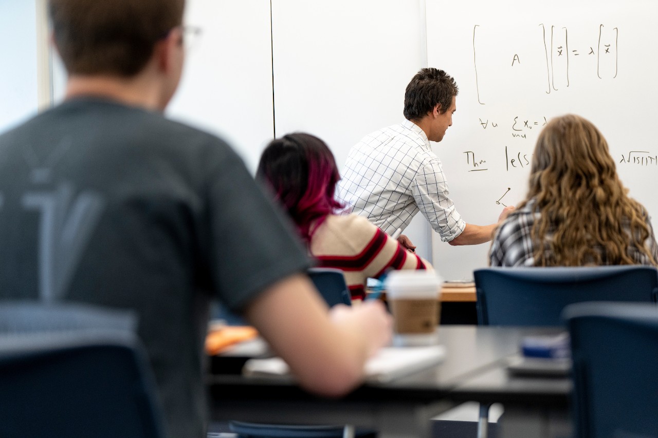 teacher doing math in class