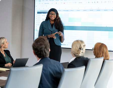 woman giving a presentation in a conference room