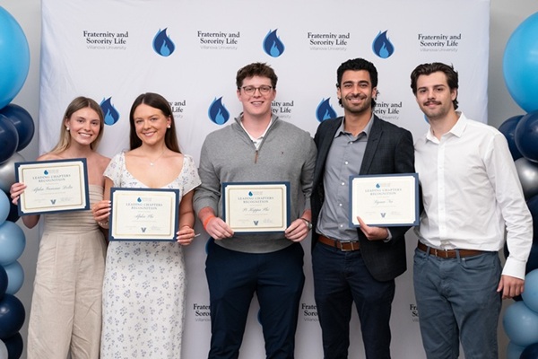 Students posing with their awards