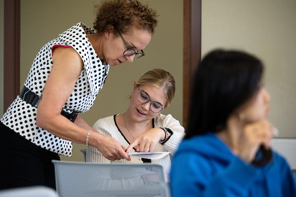 Female professor helping a student