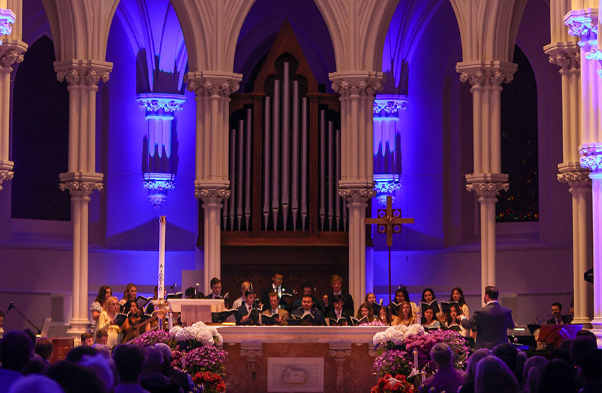 the Villanova Pastoral Musicians perform in the front of the St. Thomas of Villanova Church