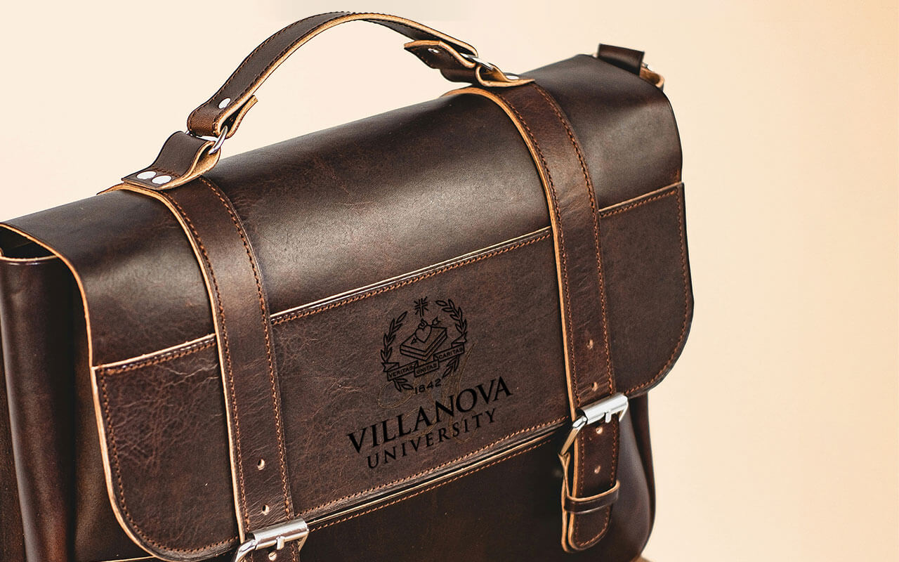 A brown leather briefcase embossed with the Villanova University logo for a story about paralegals.