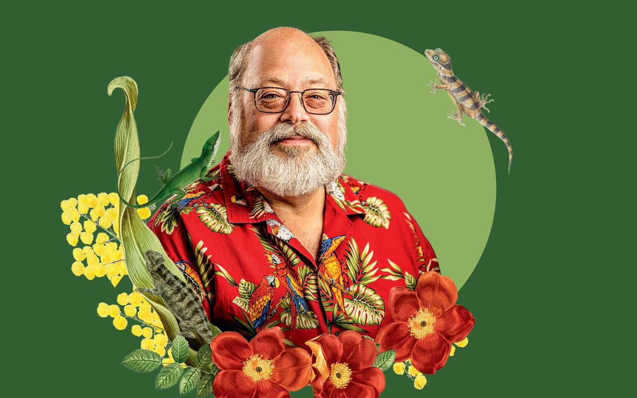 Portrait of Aaron Bauer against a green background with illustrated flowers and reptiles.